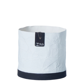 Krllet papirspotte p cementeret bund, Hvid